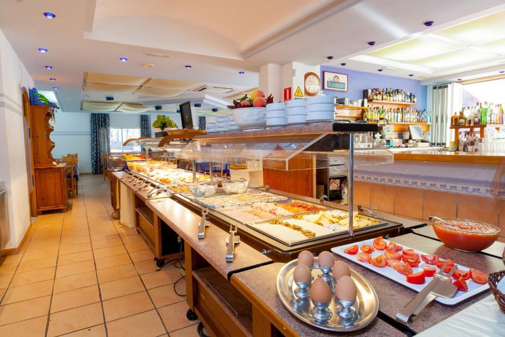 Ses Eufabietes Apartments & Restaurant Пляж Миджорн Экстерьер фото